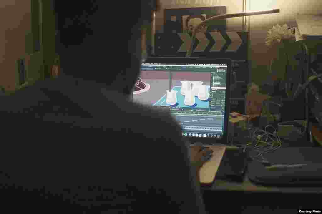 Waleed al-Ward, a graphic designer and member of Yemen Used to Be, works on a project to document Yemen’s native food. (Photo courtesy of Waleed al-Ward) 