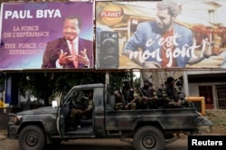 Cameroonian elite Rapid Intervention Battalion (BIR) members patrol in the south west city of Buea, Cameroon, Oct. 5, 2018.