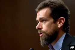 Twitter Chief Executive Officer Jack Dorsey testifies before a Senate Intelligence Committee hearing on foreign influence operations and their use of social media on Capitol Hill, Sept. 5, 2018, in Washington.