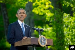 FILE - President Barack Obama listens during a news conference after meeting with Gulf Cooperation Council leaders and delegations at Camp David in Maryland, May 14, 2015.