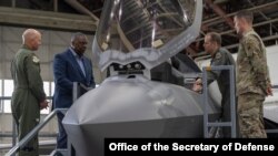 Secretary of Defense Lloyd Austin is briefed on the U.S. Air Force F-35 Lightning II assigned to 354th Fighter Wing, Eielson Air Force Base, Alaska, July 24, 2021. (Credit: Department of Defense)