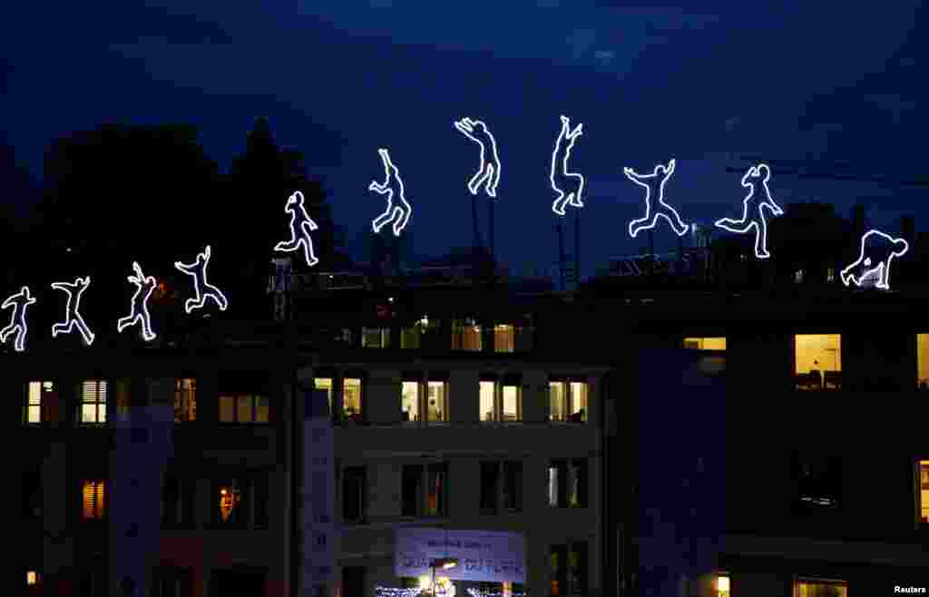 The light installation &quot;Run Beyond&quot; by Angelo Bonello is pictured ahead of the opening of the Lausanne Lumieres light festival in Lausanne, Switzerland.
