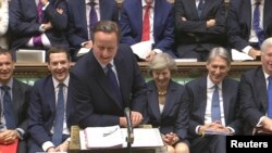 FILE - Britain's outgoing Prime Minister, David Cameron, speaks during Prime Minister's Questions in the House of Commons, in central London, Britain in this still image taken from video, July 13, 2016. 