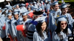 Students participate in a graduation ceremony at Columbia University in New York, May 17, 2017. 