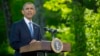 President Barack Obama listens during a news conference after meeting with Gulf Cooperation Council leaders and delegations at Camp David in Maryland, May 14, 2015. 