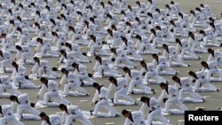 FILE - Members of the Special Warfare Command demonstrate the traditional Korean martial art of taekwondo during celebrations to mark the 65th anniversary of Korea Armed Forces Day, Seongnam, Oct. 1, 2013. 