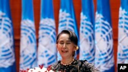 A riot police officer tries to subdue a protester during an anti-government demonstration in Hong Kong.