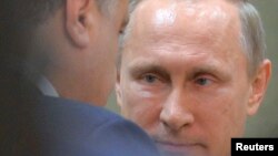 俄罗斯总统普京和乌克兰总统普罗申科2015年在明斯克参加化解乌克兰危机的会谈