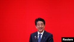 Japan's Prime Minister Shinzo Abe speaks during the 'One Year to Go' ceremony celebrating one year out from the start of the summer games at Tokyo International Forum in Tokyo, July 24, 2019.