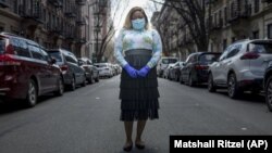 Tiffany Pinckney poses for a portrait in the Harlem neighborhood of New York on April 1, 2020. Pinckney became one of the nations first donors of "convalescent plasma." (AP Photo/Marshall Ritzell)
