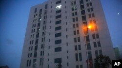 The building housing “Unit 61398” of the People’s Liberation Army is seen in the outskirts of Shanghai, Tuesday Feb. 19, 2013. 