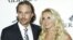Britney Spears Gets Engaged; Madonna Signs New Record Deal