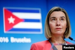FILE - European Union foreign policy chief Federica Mogherini holds a news conference after meeting Cuba's Foreign Minister Bruno Rodriguez at the EU Council in Brussels, Belgium.