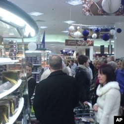 While holiday images are warm and fuzzy, the reality of the shopping crunch is something else entirely.