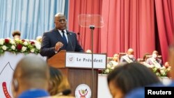 Le président Felix Tshisekedi prononce son discours annuel sur l'état de la nation lors d'une session conjointe du parlement à Kinshasa, en République démocratique du Congo, le 13 décembre 2021. 