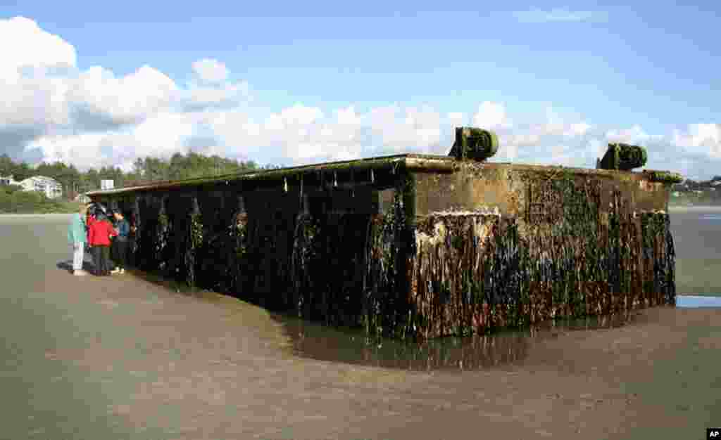 The large dock that washed ashore early on June 5, 2012 on Agate Beach in Oregon.