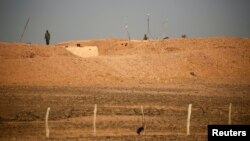 Des soldats marocains près de la zone contrôlée par le Front Polisario, dans le Sahara de l'Ouest, le 10 septembre 2016.