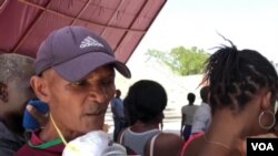 This man in Port-au-Prince, Haiti, came with his own mask on April 1, 2020, but said he still may go home infected with coronavirus.