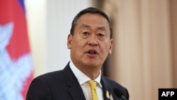 FILE - Thailand's Prime Minister Srettha Thavisin speaks alongside Cambodia's Prime Minister Hun Manet in Bangkok, Feb. 7, 2024. He said he was pulling his country out of a development agreement with Vietnam and Laos following protests that it was benefiting foreign interests. 