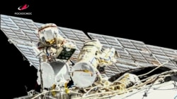 Russian cosmonauts perform a space walk earlier in 2021.