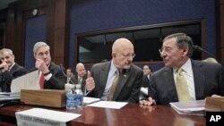 Director of National Intelligence James Clapper (second from right) and heads of other national security agencies gather on Capitol Hill to testify before the House Intelligence Committee, February 10, 2011