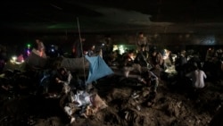Afghans gather under a bridge to consume drugs, mostly heroin and methamphetamines in Kabul, Sept. 30, 2021.