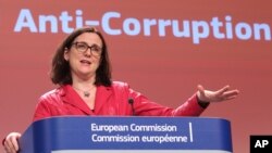 European Commissioner for Home Affairs Cecilia Malmstrom addresses the media, at the European Commission headquarters in Brussels, Monday, Feb. 3, 2014.