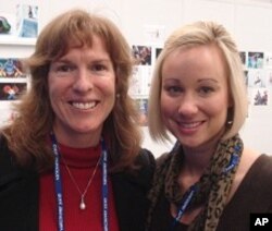 George Washington University Professor Lisa Delpy Neirotti and student Morgan Goerke at the Vancouver Winter Olympics, 26 Feb. 2010