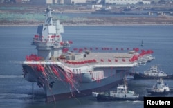 FILE PHOTO - China's first domestically built aircraft carrier is seen during its launch ceremony in Dalian, Liaoning province, China, April 26, 2017.