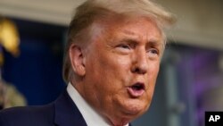 Predsednik Donald Tramp govori na konferenciji za novinare u Beloj kući, 23. jul 2020. 