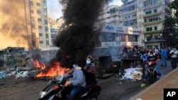 Saad Hariri's supporters block streets in Beirut, Lebanon, Thursday, July 15, 2021.