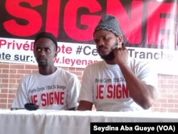 FILE - Senegalese rappers ''Fou Malade'' et ''Thiat'', founding members of "Y en a marre" à Dakar, Aug. 17, 2017. (VOA/Seydina Aba Gueye)