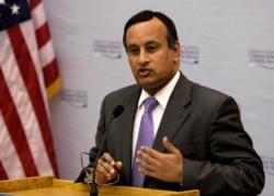 FILE - Then-Pakistan Ambassador Husain Haqqani speaks at the University of Arkansas Clinton School of Public Service in Little Rock, Arkansas, July 29, 2009.