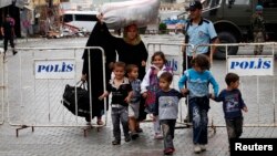 Reyhanlı'daki Suriyeli sığınmacı aile