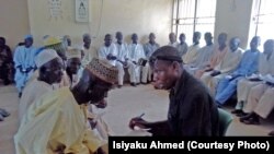 An optician interviews cataract patients at Gunduma Hospital System Council General Hospital, Dutse, before patients undergo surgery to prevent blindness.
