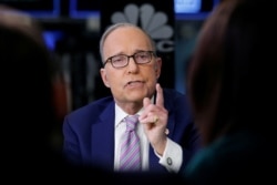 FILE - Economic analyst Larry Kudlow appears on CNBC at the New York Stock Exchange, (NYSE) in New York, March 7, 2018.