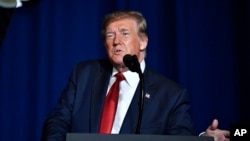 Presiden Donald Trump berpidato di hadapan para hadirin dalam perayaan tahunan ke-75 Konvensi nasional AMVETS di Louisville, Kentucky, 21 Agustus 2019.