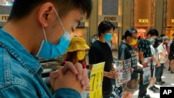 Protesters gather at a shopping mall in Central during a pro-democracy protest against Beijing's national security law in Hong Kong, June 30, 2020.