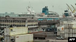 FILE - A general view of the port of Douala is seen March 15, 2018. Two transgender women were arrested in a restaurant in the city in February, and have been sentenced to five years in prison.