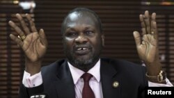 FILE - South Sudan's rebel leader Riek Machar addresses a news conference in Uganda's capital Kampala, Jan. 26, 2016. 