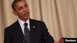US President Barack Obama speaks during a joint media conference with Thai Prime Minister Yingluck Shinawatra at Government House in Bangkok, November 18, 2012.