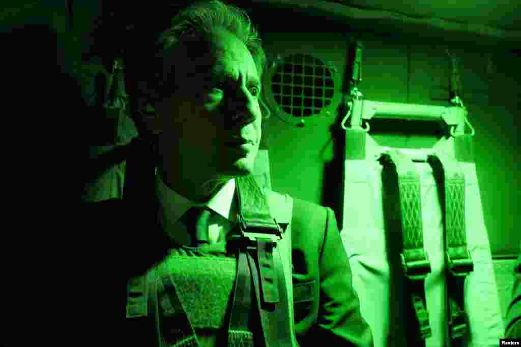 U.S. Secretary of State Antony Blinken rides in a helicopter on the way back from the U.S. embassy to the airport ahead of his departure, in Baghdad, Iraq.