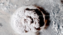 The eruption of an underwater volcano off Tonga, which triggered a tsunami warning for several South Pacific island nations, is seen in an image from the NOAA GOES-West satellite taken at 05:00 GMT, Jan. 15, 2022.