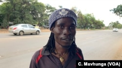 Simbai Rice, one of the demonstrators gathered in Harare, Jan. 14, 2019, says President Emmerson Mnangagwa's administration has failed to address increasing shortages of cash and basic food items.