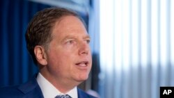 Geoffrey Berman, the United States Attorney for the Southern District of New York,holds a press conference, Aug. 8, 2018, in New York. 