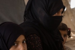 More than 70,000 people stay in tents at Al-Hol Camp in northern Syria. The majority of them are women and children from the last IS-controlled areas; many still hope to see a new 'Caliphate' emerge in the region, Aug. 26, 2019. (Yan Boechat/VOA)