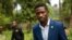 Uganda's leading opposition challenger Bobi Wine walks back to his residence after giving a press conference outside Kampala, Uganda, Jan. 15, 2021, one day after Ugandans went to the polls. 