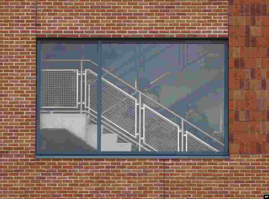 Members of of SWAT team walk up the steps of a parking garage in response to an attack on the campus of Ohio State University in Columbus, Ohio.