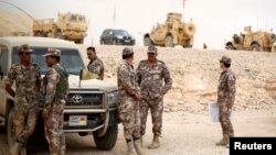 FILE - Jordanian soldiers take part in Exercise Eager Lion at one of the Jordanian military bases in Zarqa, east of Amman, Jordan, May 24, 2016.