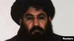 Mullah Akhtar Mohammad Mansoor, Taliban militants' new leader, is seen in this undated handout photograph by the Taliban. 